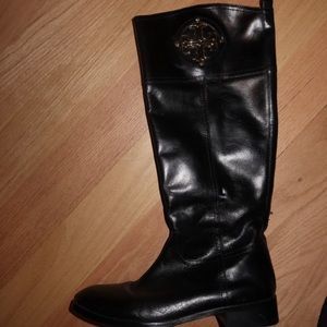Tory Burch black leather under-the-knee boots.